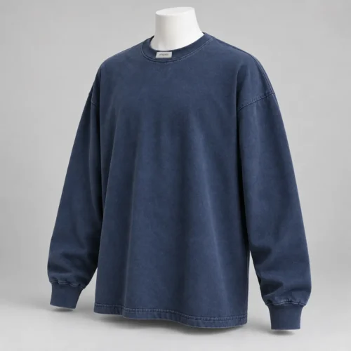 Men's Oversized Fit Long Sleeve T-Shirt in washed midnight indigo by Attirings, three-quarter view