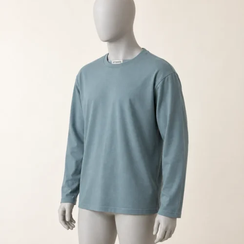 Men's Relaxed Fit Long Sleeve T-Shirt in muted dusty blue by Attirings, three-quarter view